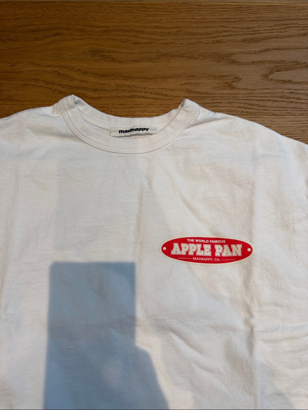 Madhappy White Tee with Red Apple Pan Chest Logo